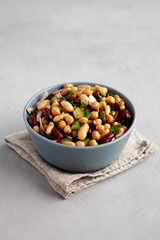 Homemade Three Bean Salad in a Bowl, side view.