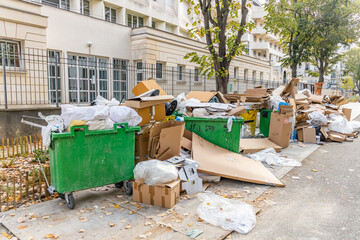 Full garbage bins during a waste collection service strike in Paris, France