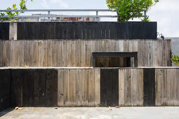 empty wooden benches on the roof of a café building