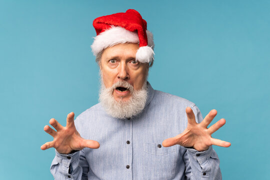 Angry Santa Scares Kids, Man Wears Santa Hat Show Aggressive Emotions - Negative And Bad Mood Christmas Concept