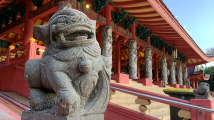 chinese lion statue in buddhist temple