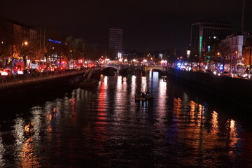 Fototapeta na wymiar River Liffey and City View of Dublin City at Night in Ireland