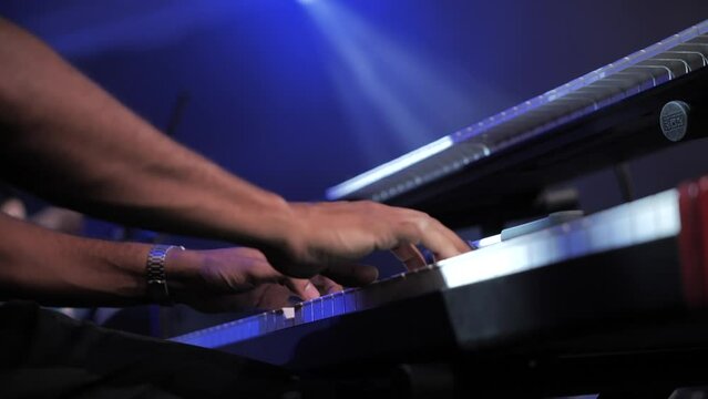 Pianist playing on stage