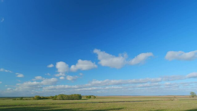 Picturesque autumn nature. Rural landscape with a field. Countryside. Timelapse.