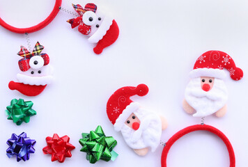 Background for the New Year, festive bows and headbands with decor, top view. Christmas and New Year concept, banner with blank space