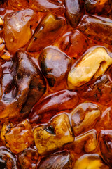 Abstract texture and background of amber stone.