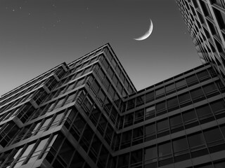 Black and white photo with modern building and night sky © Jan Habarta