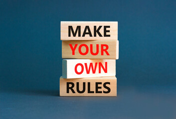 Make your own rules symbol. Concept words Make your own rules on wooden cubes. Beautiful grey table...