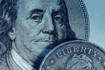 One hundred US Dollar bill and coin with description: Liberty as symbol: America - the land of...