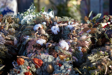 Christmas wreaths made of natural matirials, dry flowers and herbs, selective focus