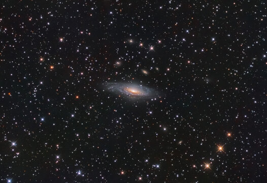NGC 7331 galaxy in the andromeda constellation, and some stars at the background.