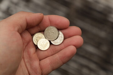 Several Turkish coins in hand