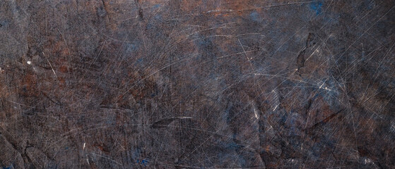 Dark abstract background of scratched surface. Faded paint texture. Grunge surface vintage backdrop