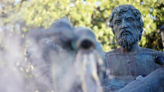 Close-up of a fountain that represents Turia River in the Plaza de la Virgen, Valencia, Spain