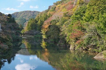 Fototapeta na wymiar Shimane,Japan - November 8, 2022: Furoukyo bridge over Kando river at Tachikue gorge, Shimane, Japan 