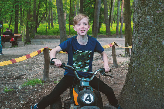 Boy riding an electric quad bike