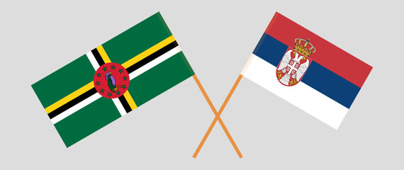 Crossed flags of Serbia and Dominica. Official colors. Correct proportion