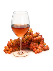 Glass with rose wine and bunch of grapes
