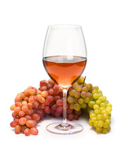 Glass with rose wine and bunch of grapes