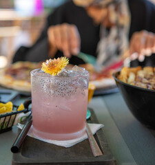 Health juice with yellow flowers