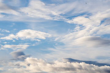 A beautiful blue autumn sky with white fluffy clouds makes for a fabulous overall view of the sky
