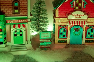 Christmas village house and toy store with forest