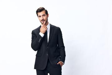 Portrait of a man in an expensive business suit on a white background isolated, copy space. Businessman startup technology