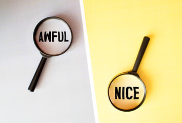 Awful and nice antonyms word on block. Concept.