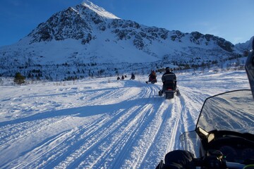 Snowmobiling in the mountains