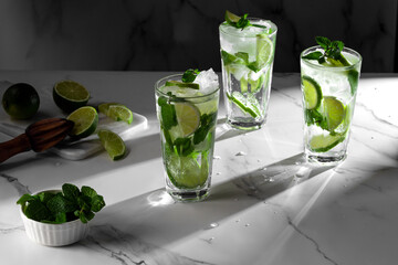 Mojito cocktails on white marble table