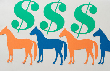 paper horses and paper dollar signs