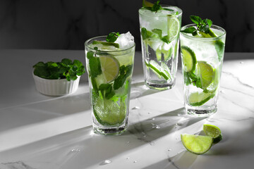 Mojito cocktails on white marble table