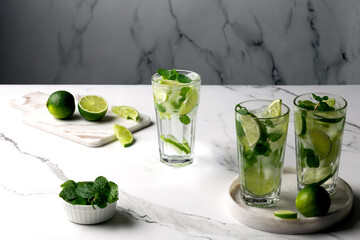 Mojito cocktails on white marble table