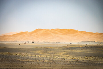 sand dunes of erg chebbi during sandstorm, merzouga, morocco, north africa, sahara
