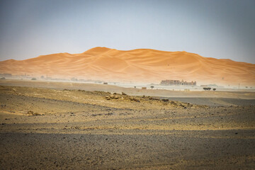 sand dunes of erg chebbi during sandstorm, merzouga, morocco, north africa, sahara