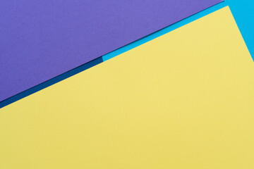 purple, yellow, and blue paper background with line
