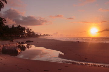 Sunrise reflection at the  beach