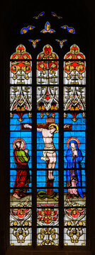 Stained-glass window depicting The Crucifixion of the Lord. Notre-Dame de Luxembourg (Notre-Dame Cathedral in Luxembourg). 2021/07/04