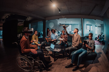 Business persons with a disability at work in modern open space coworking office on team meeting using virtual reality goggles.