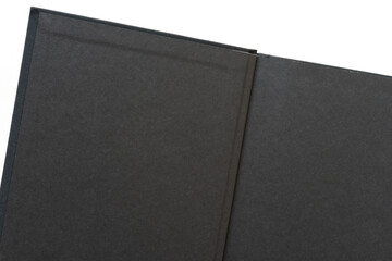 open hardcover book with black endpapers