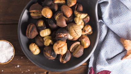 Roasted chestnuts in cast iron pan