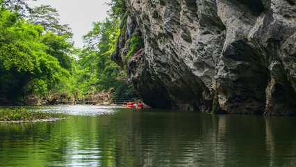 In the morning, learn to kayak, work out, in a river surrounded by mountains in Lampang, Thailand.