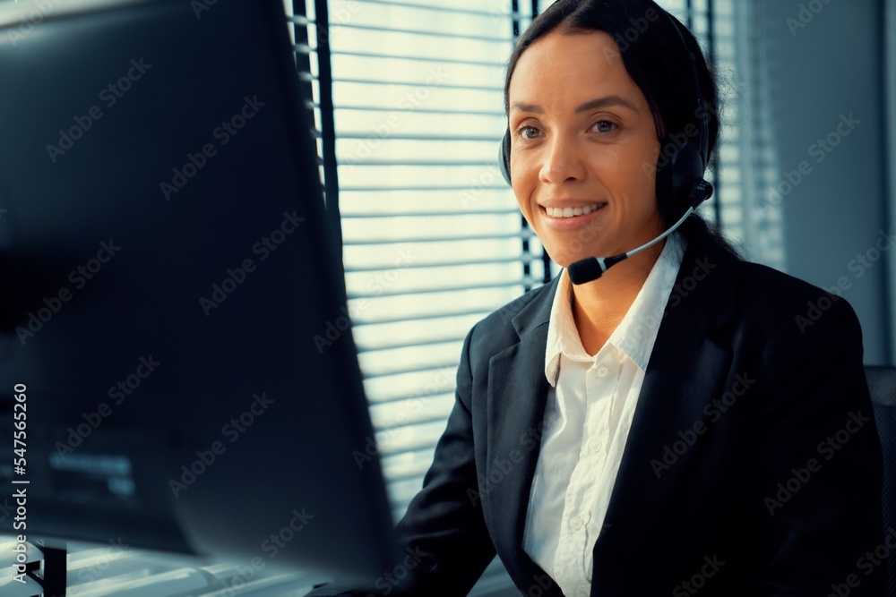 Aufkleber competent female operator working on computer and talking with clients. concept relevant to both cal