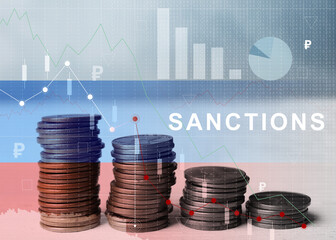 Economic sanctions against Russia because of invasion in Ukraine. Stacked coins on table,...