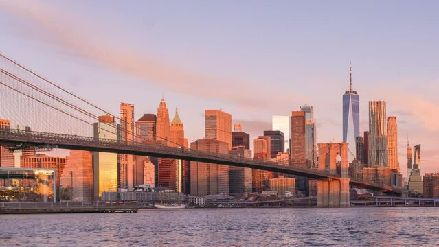 Manhattan Skyline and Brooklyn Bridge at Sunrise - Time Lapse
