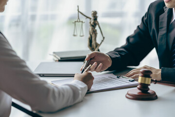 legal advisory office Lawyer in with hammer, symbol of justice Lawyer businessman working or reading law book in workplace for lawyer consulting concept
