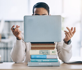 Laptop, books and confused business student planning creative startup, digital marketing company or small business brand. Stress, anxiety and designer man on technology in research study or education