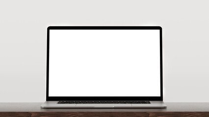 Laptop on wooden table, grey wall background. Laptop with blank white screen mockup on wooden table. Front view laptop, grey background