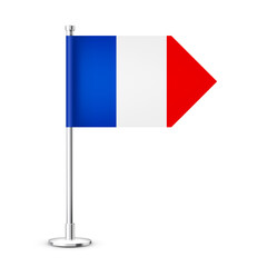 Realistic French table flag on a chrome steel pole. Souvenir from France. Desk flag made of paper or fabric and shiny metal stand. Mockup for promotion and advertising. Vector illustration