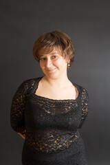 woman on a black background close up